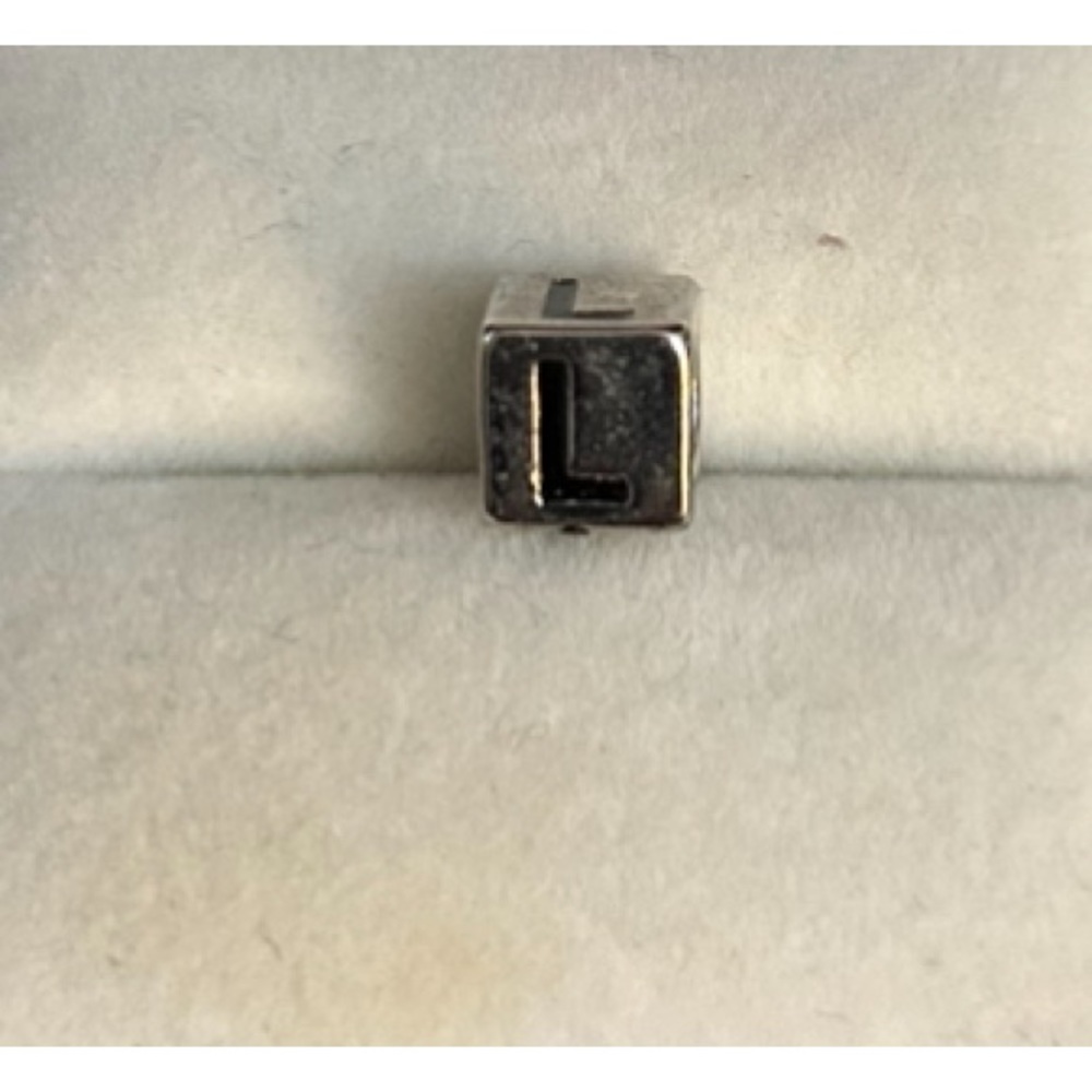 Retired L Michael Hill charm